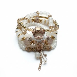 Mini fancy SP armband, wit goud geel
