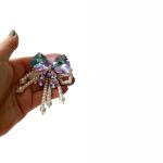 paarse strik kraal met pompon en parelstrikje, diy Fancy Bead, pen topper kraal